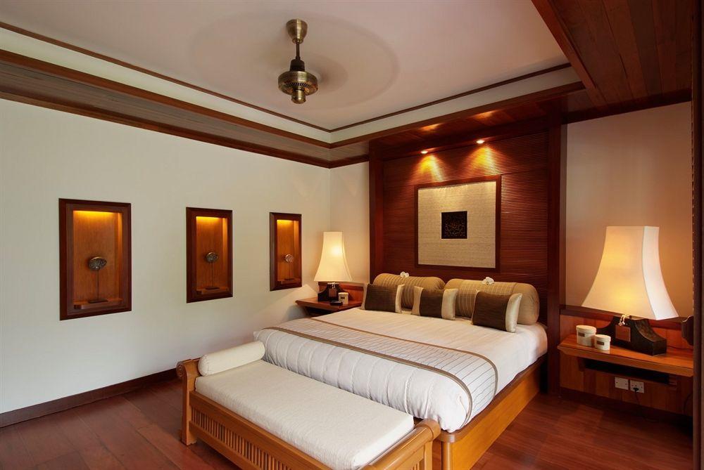 منتجع تانجونج جارا دونجون الغرفة الصورة A bedroom at the Taj Bengal