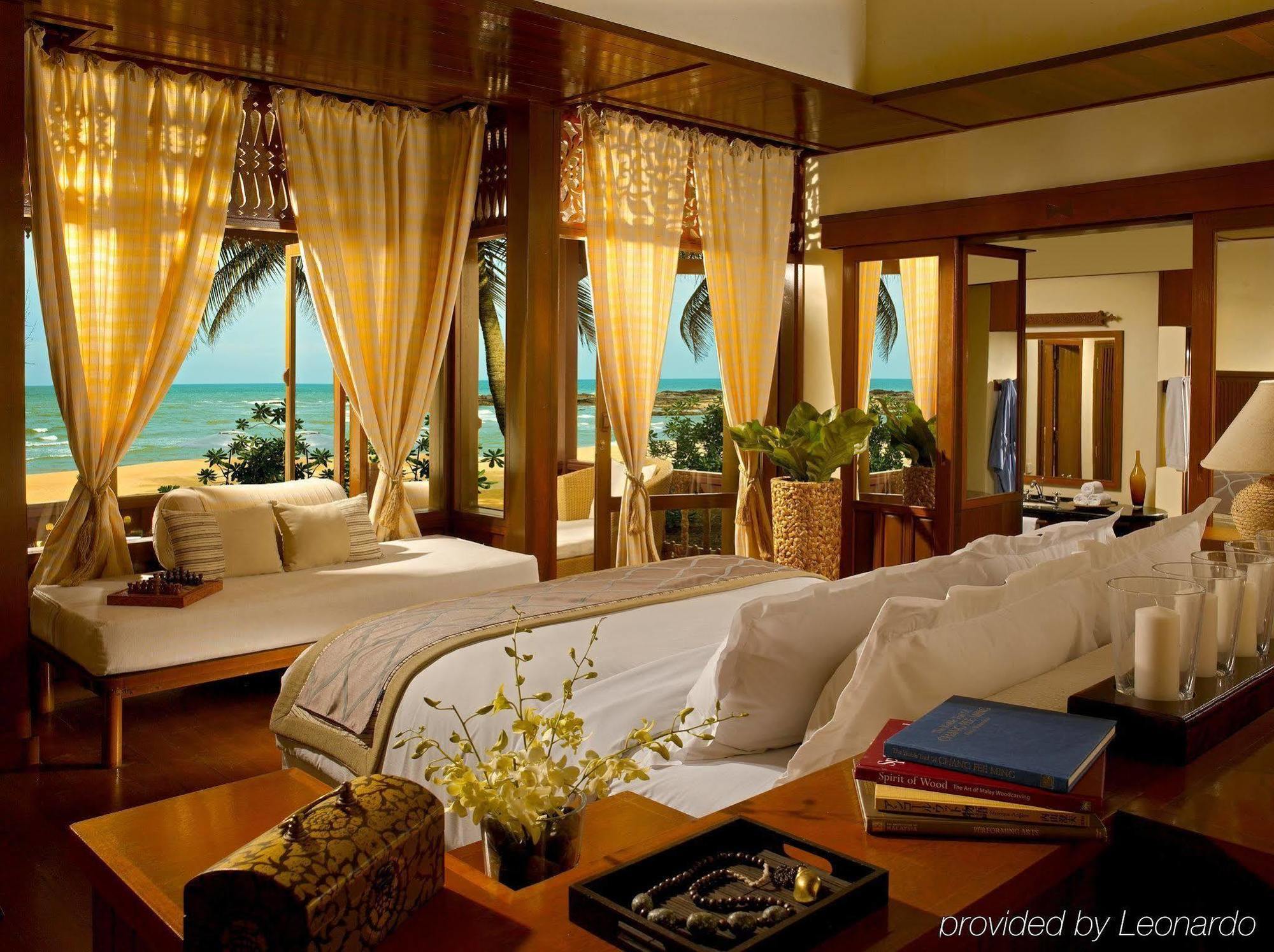 منتجع تانجونج جارا دونجون الغرفة الصورة A bedroom at the Four Seasons Resort